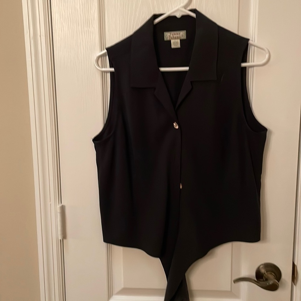 Like new. Tommy Bahamas black shirt with tie bottom. Size L. Smoke free home
